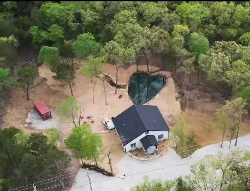 Aerial view of a completed home and roof